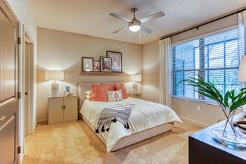 a bedroom with a bed and a ceiling fan at The Beck at Hidden River, Tampa, FL, Florida , 33637